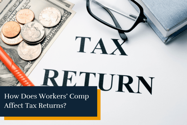 tax return papers with glasses and money on a table