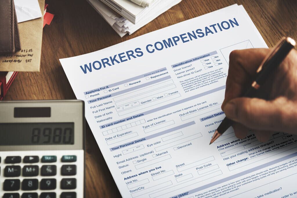 an employee filling out a workers' compensation form